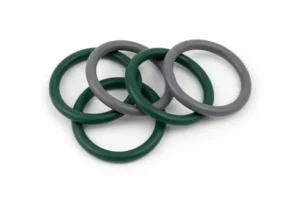 Anéis de vedação em silicone (O-rings) em verde escuro e cinza fabricados pela ADGI Proquiminas