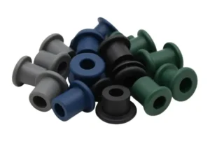 Batoques de silicone (grommets) em cinza, azul, preto e verde fabricados pela ADGI Proquiminas