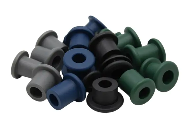 Batoques de silicone (grommets) em cinza, azul, preto e verde fabricados pela ADGI Proquiminas